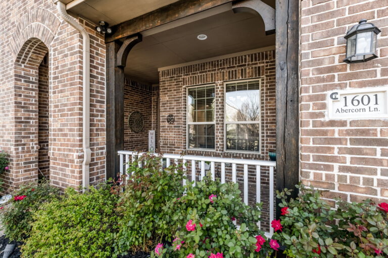 exterior front porch of the residence located at 1601 Abercorn Ln