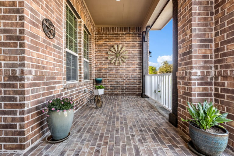 exterior front porch of the residence located at 1601 Abercorn Ln