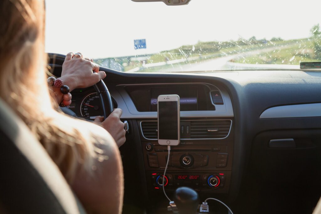 a person driving during daytime