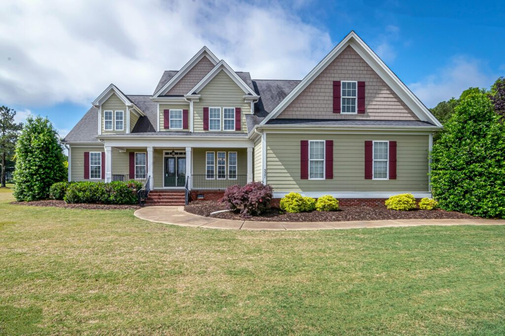 an american suburban family house with well maintained front yard